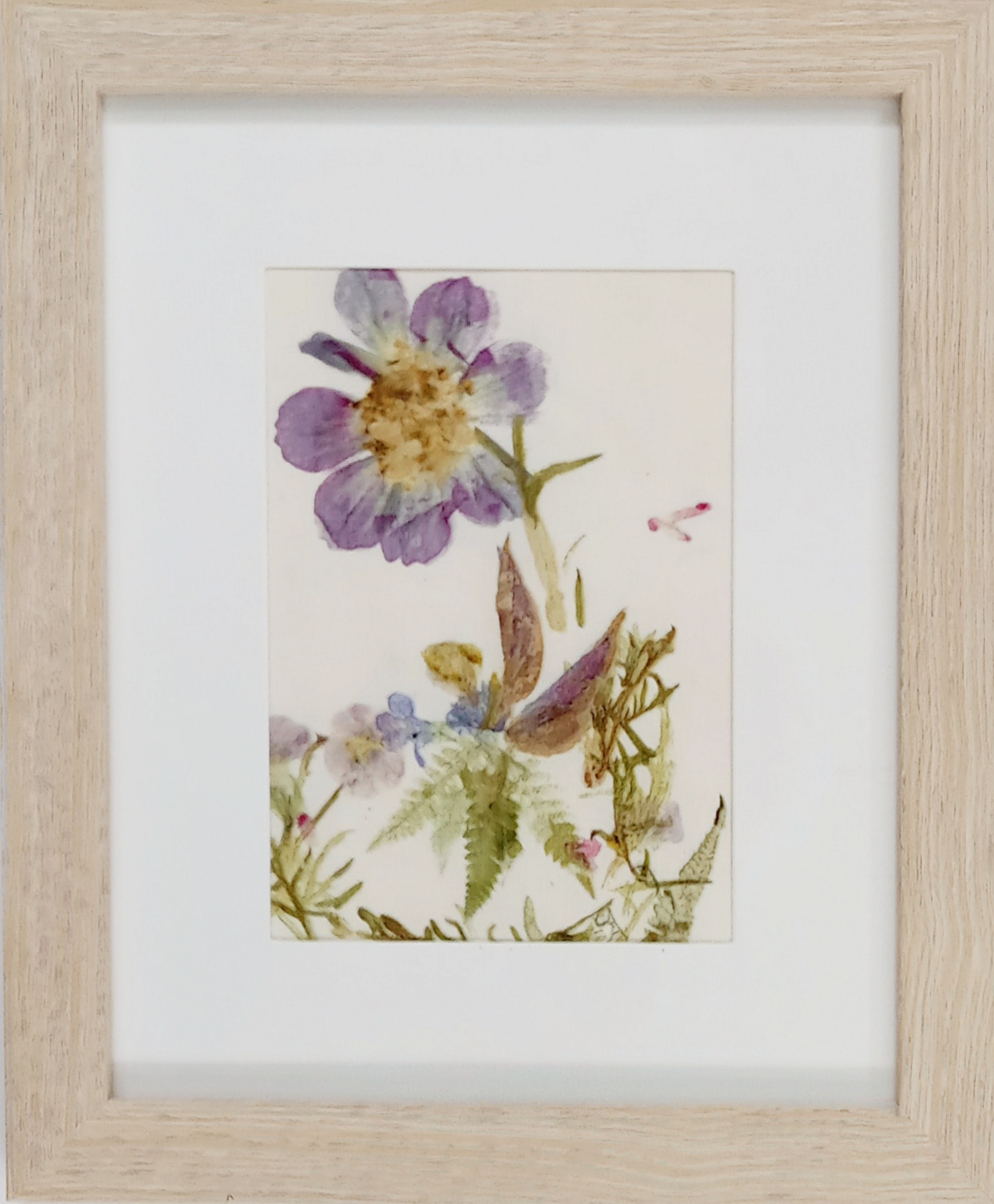 Hidden Angel II — framed botanical pounding artwork on mordanted muslin with purple, yellow, and green floral forms